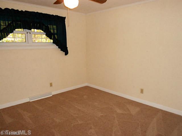 329 Bescher Chapel Road Trinity, NC 27370 - Photo 15 of 16 3rd Bedroom. Large, newer windows throughout.