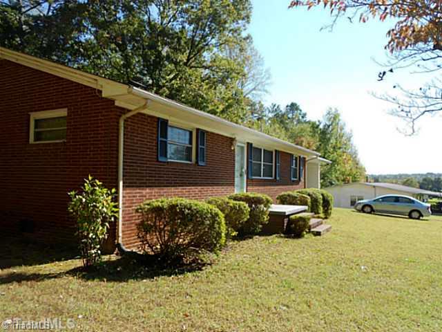 329 Bescher Chapel Road Trinity, NC 27370 - Photo 4 of 16 Exterior Front. Well maintained landscaping