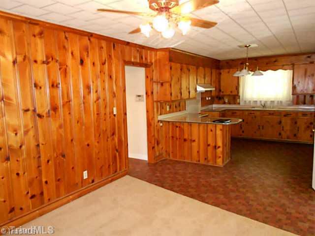 329 Bescher Chapel Road Trinity, NC 27370 - Photo 10 of 16 Dining Room. View from living room into hallway leading to large bedrooms.