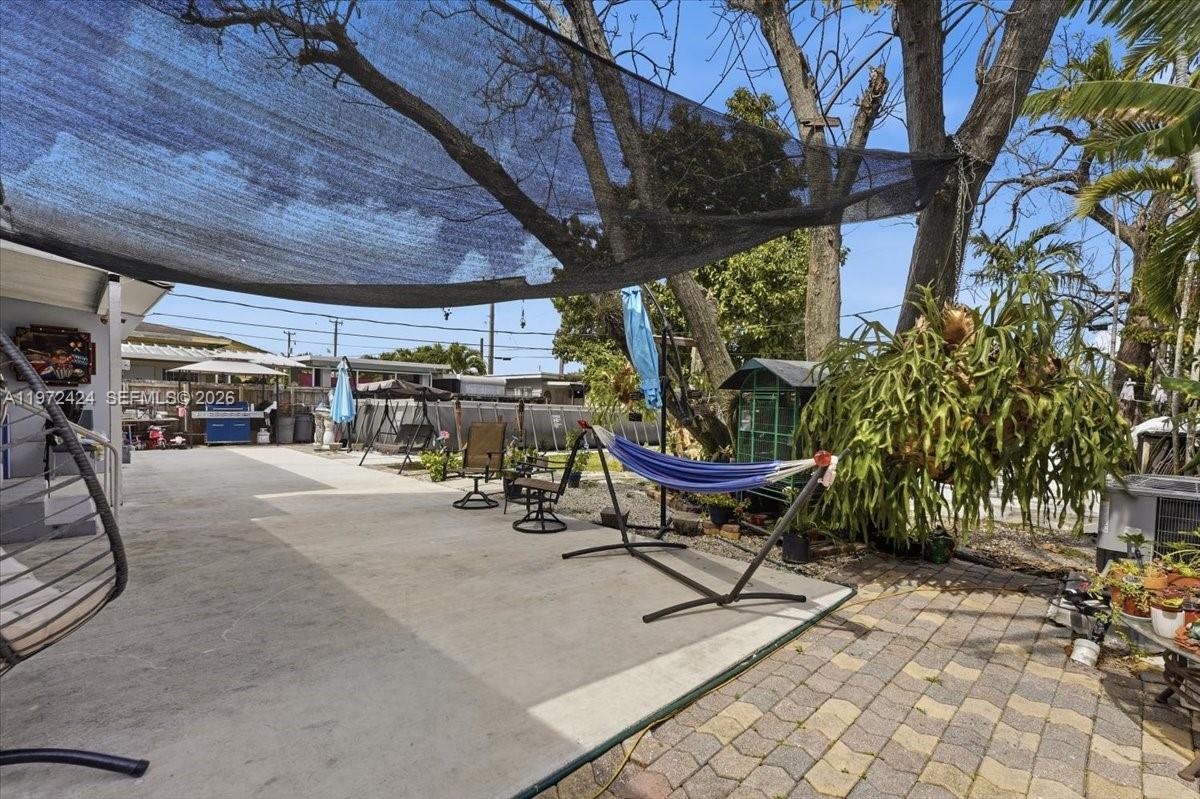 511 East 27th Street Hialeah, FL 33013 - Photo 24 of 24 a view of a chairs and table in a patio