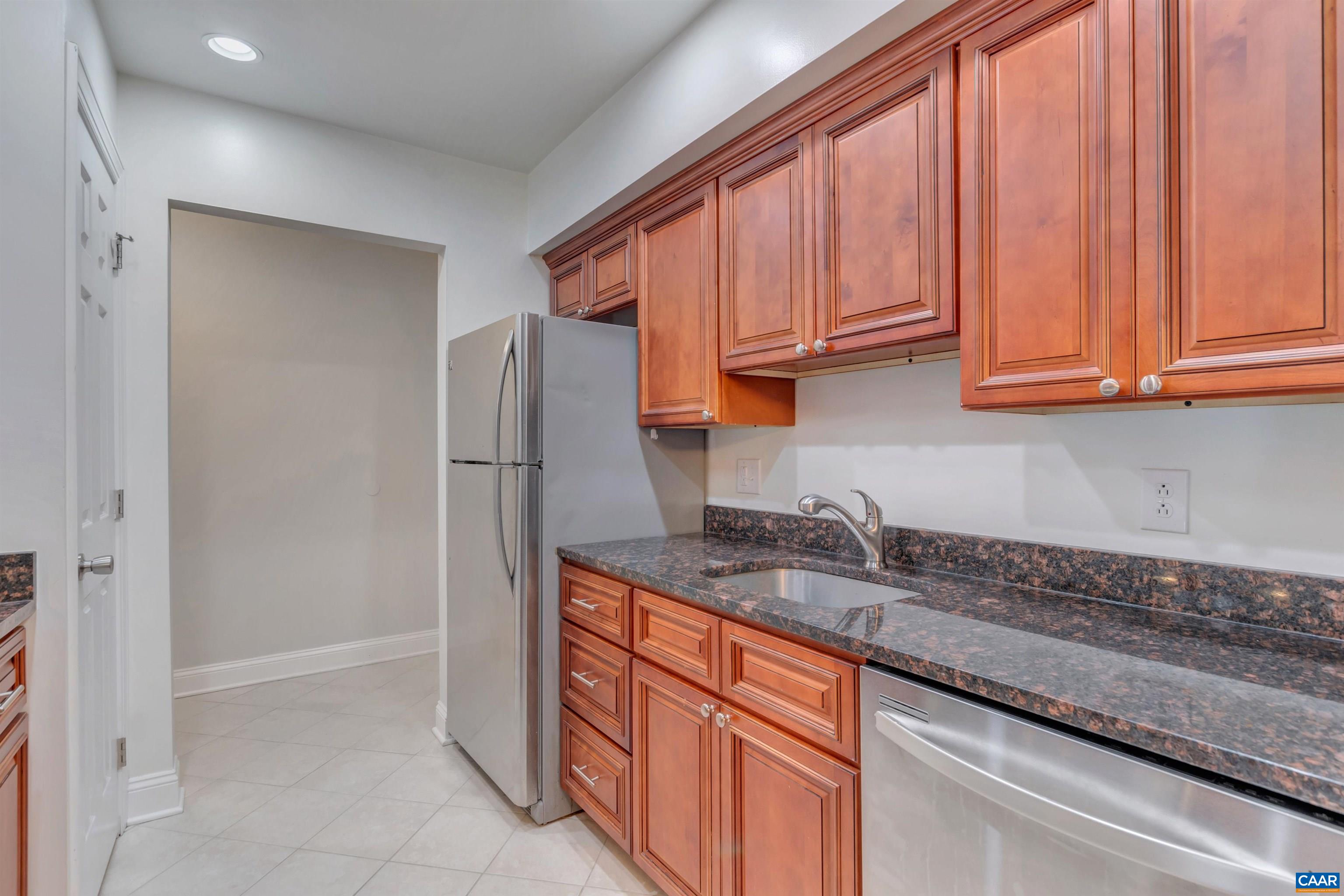 110 Turtle Creek Road Charlottesville, VA 22901 - Photo 12 of 44 a kitchen with stainless steel appliances granite countertop a refrigerator and a sink