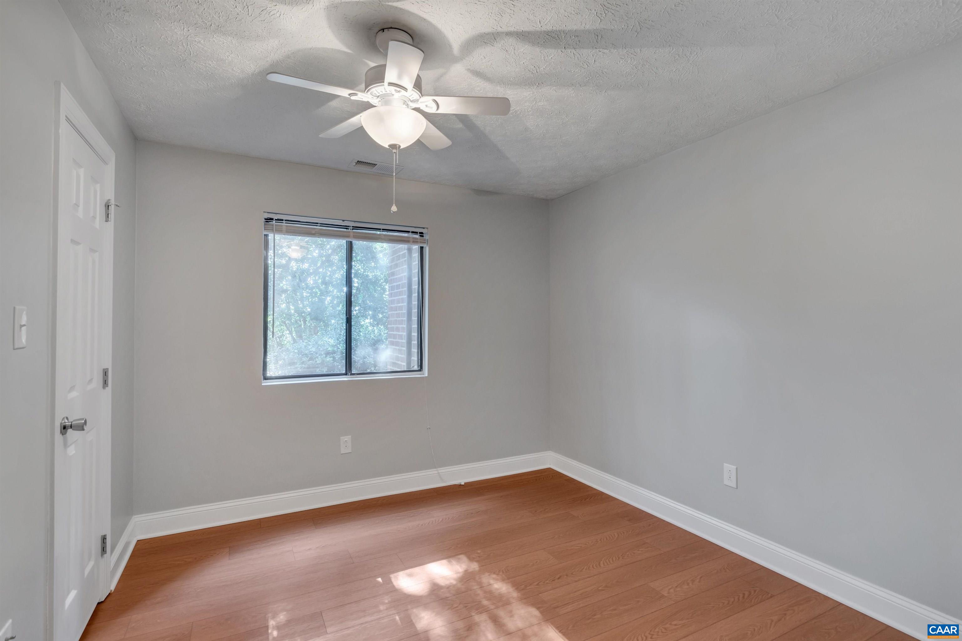 110 Turtle Creek Road Charlottesville, VA 22901 - Photo 20 of 44 an empty room with a window