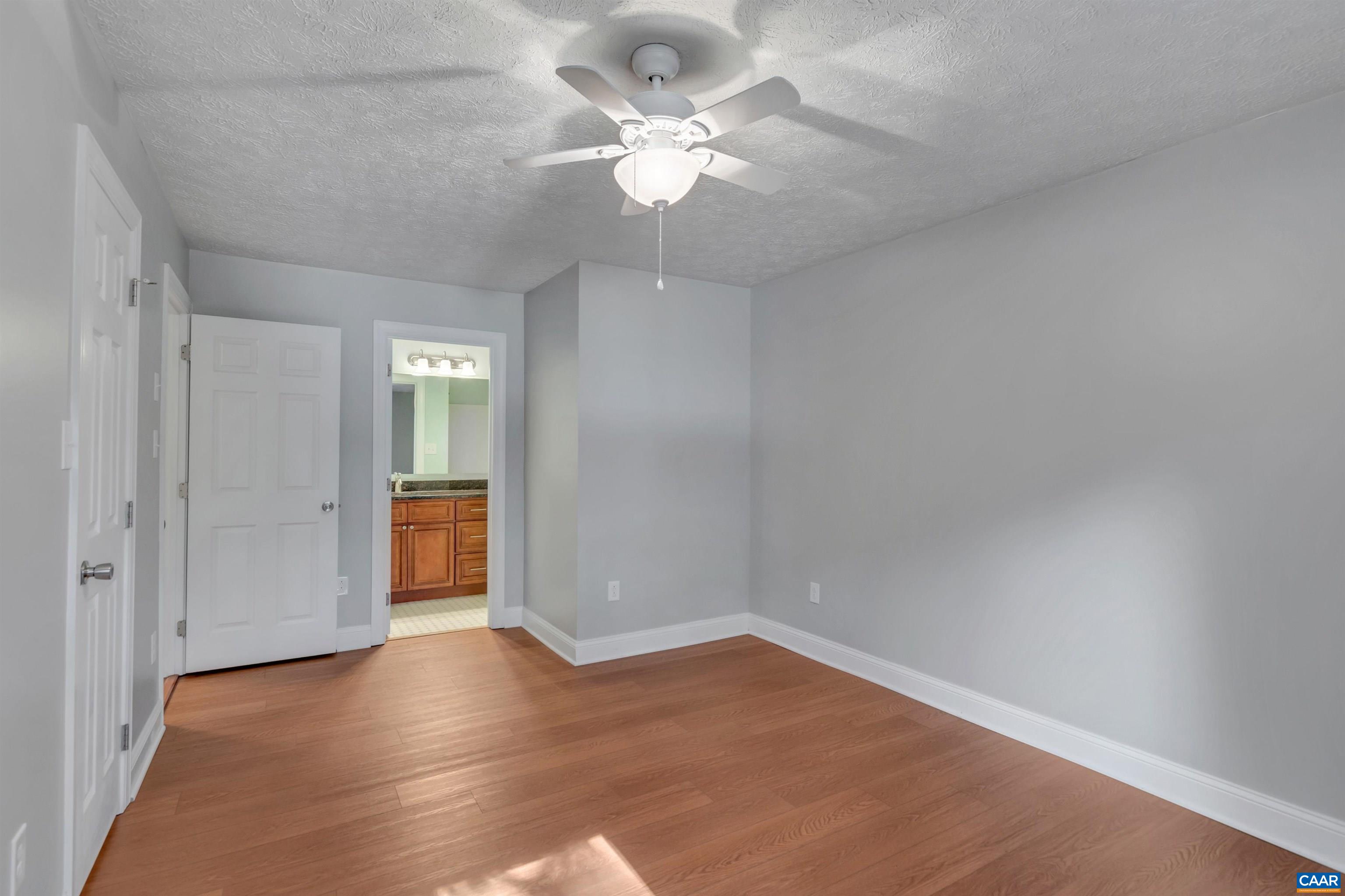 110 Turtle Creek Road Charlottesville, VA 22901 - Photo 22 of 44 wooden floor in an empty room with a window