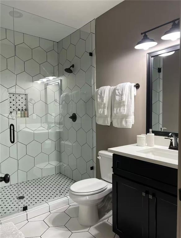 950 Island Shoals Road Jackson, GA 30233 - Photo 13 of 23 a bathroom with a sink toilet and shower