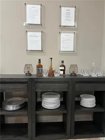 a kitchen with a table and chairs in it
