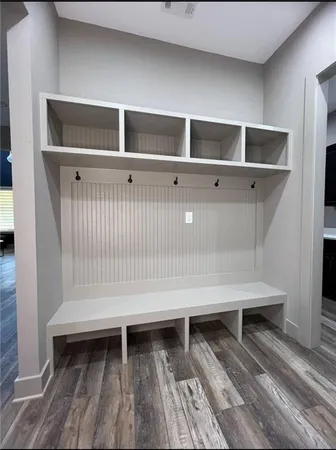a view of entryway with wooden floor