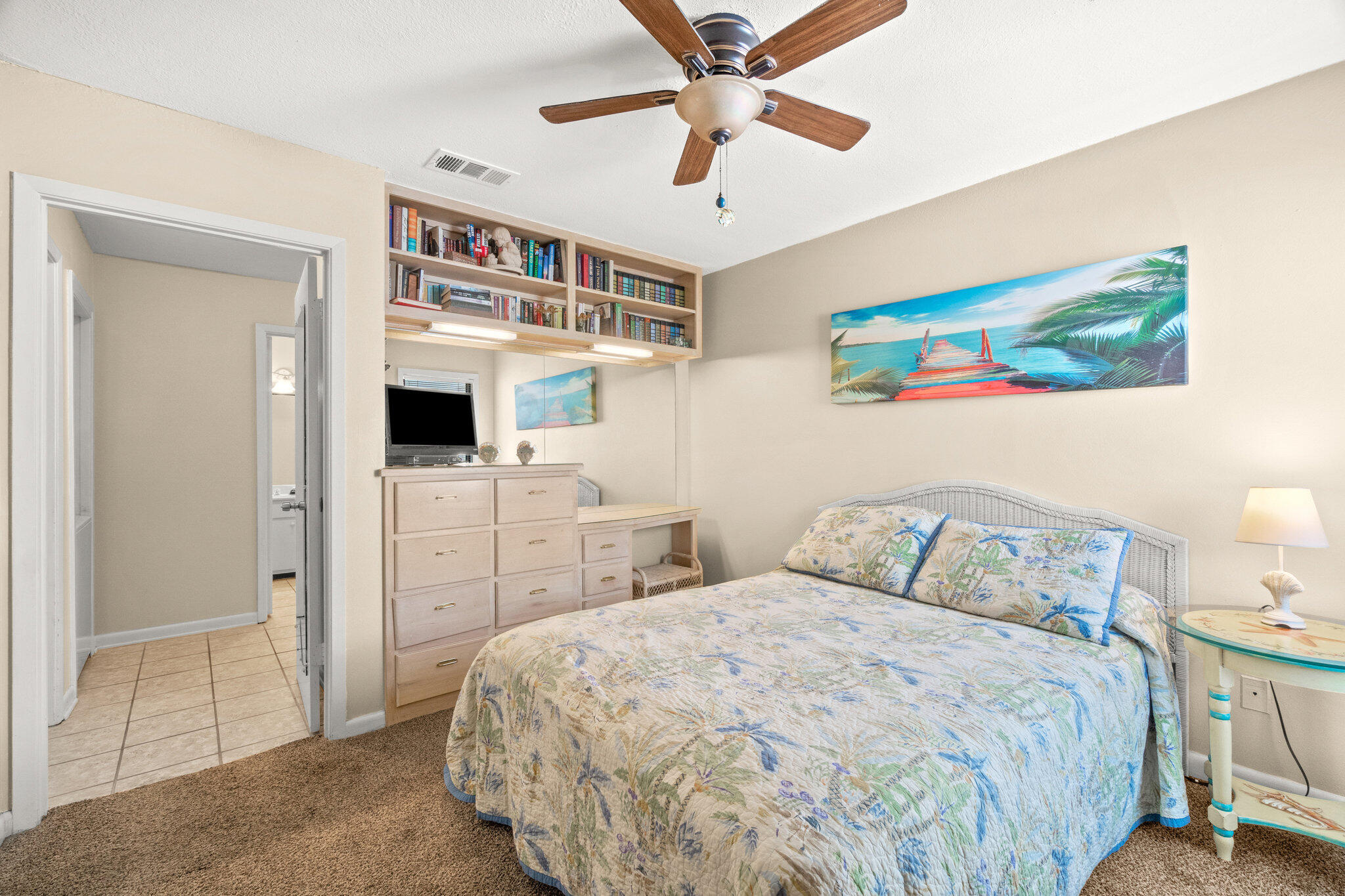 752 Sandpiper Drive, Unit 10535 Miramar Beach, FL 32550 - Photo 15 of 32 a bedroom with a bed and a view of kitchen