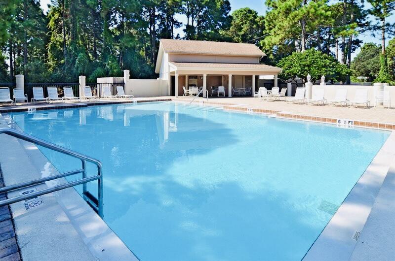 752 Sandpiper Drive, Unit 10535 Miramar Beach, FL 32550 - Photo 22 of 32 a view of a house with a backyard