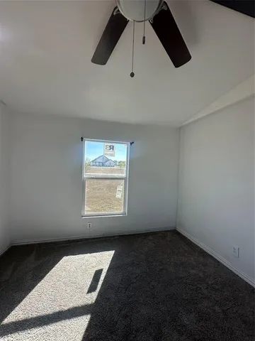 a bathroom with a double vanity sink toilet and a mirror