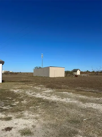 a view of an ocean and mountain