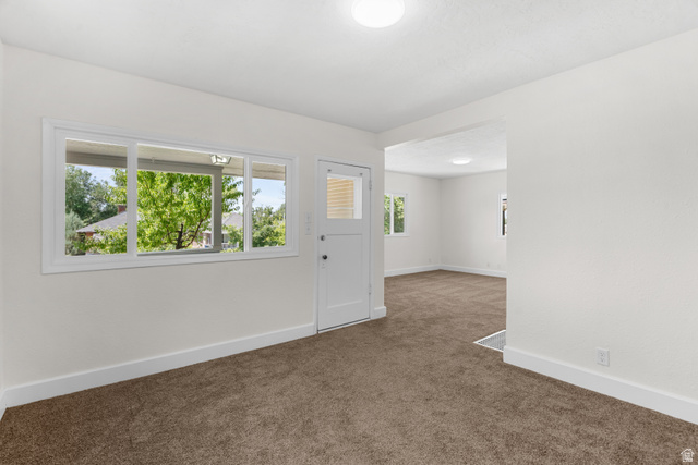 2862 Fowler Avenue Ogden, UT 84403 - Photo 10 of 23 Interior room with neutral carpet, white walls, and white baseboards