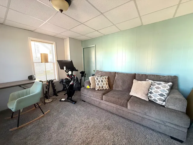 a living room with furniture and a couch