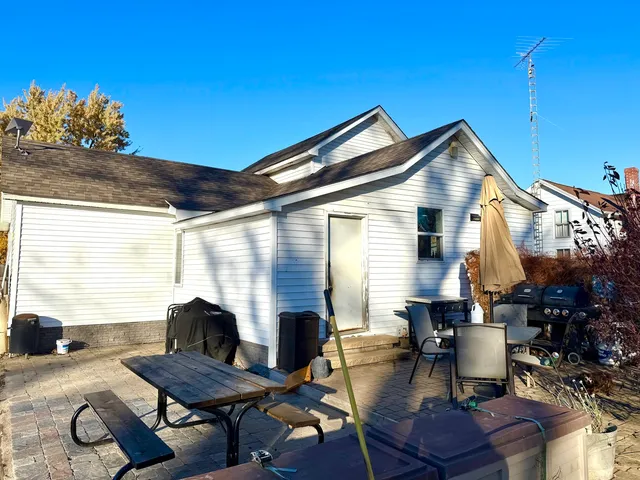 a view of a livingroom with furniture and a book