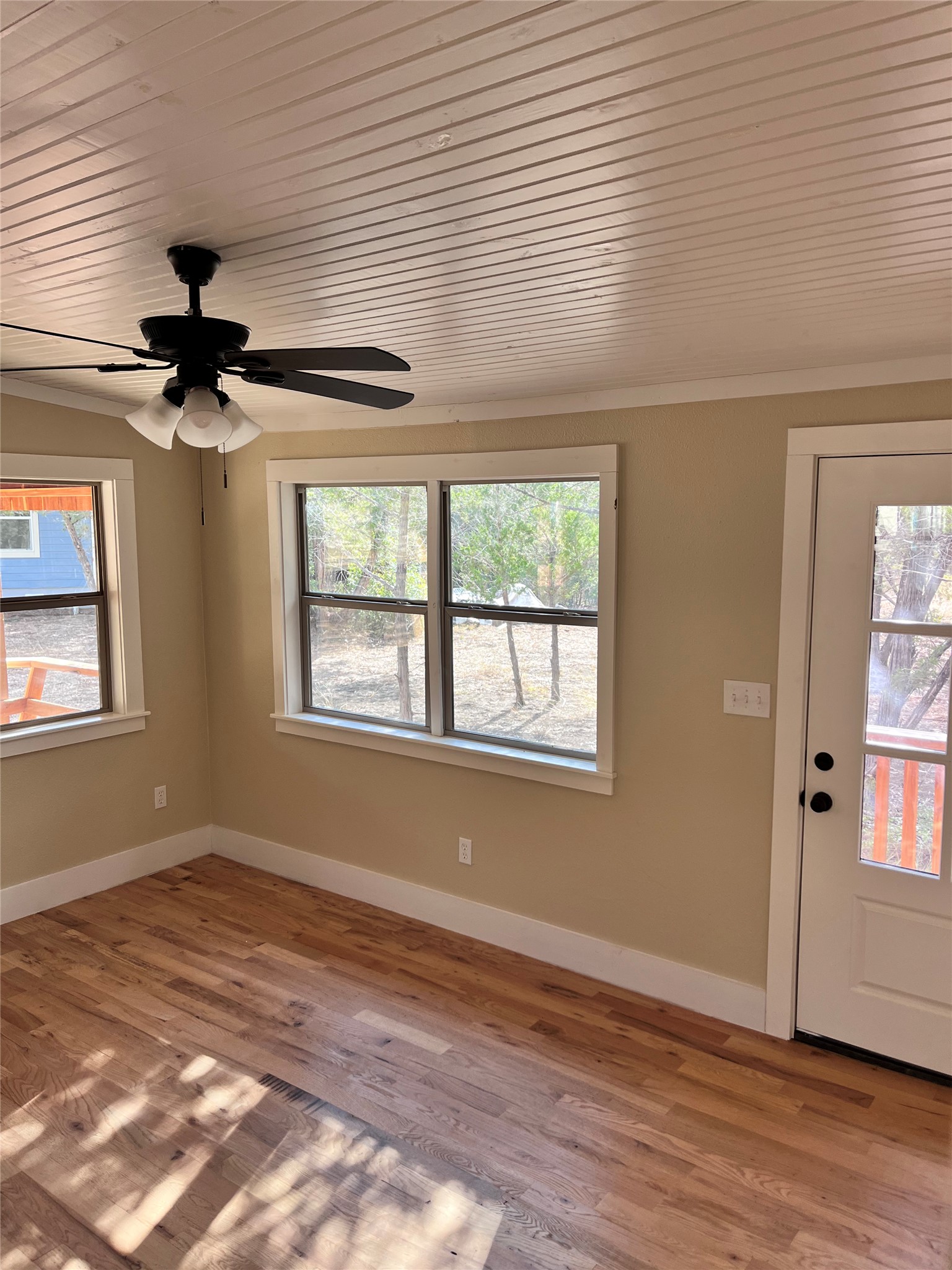1565 Pump Station Road, Unit B Wimberley, TX 78676 - Photo 8 of 12 Entryway featuring light wood-style floors and a ceiling fan