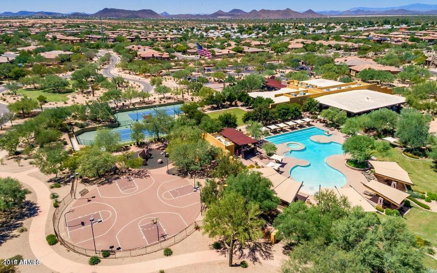 3935 East Rough Rider Road, Unit 1385 Phoenix, AZ 85050 - Photo 14 of 14 a view of a city with a lake