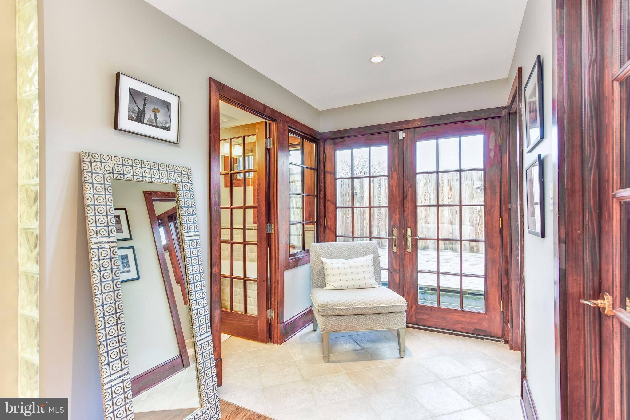 1016 Massachusetts Avenue Northeast Washington, DC 20002 - Photo 18 of 28 a living room with furniture and a window