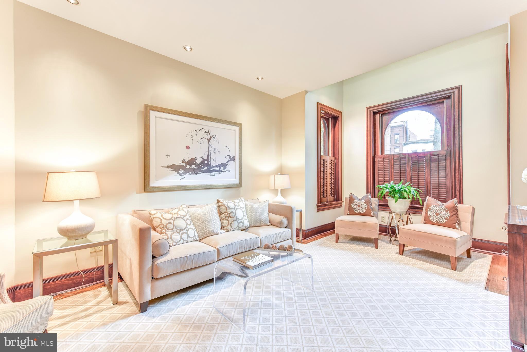 1016 Massachusetts Avenue Northeast Washington, DC 20002 - Photo 3 of 28 a living room with furniture and a large window