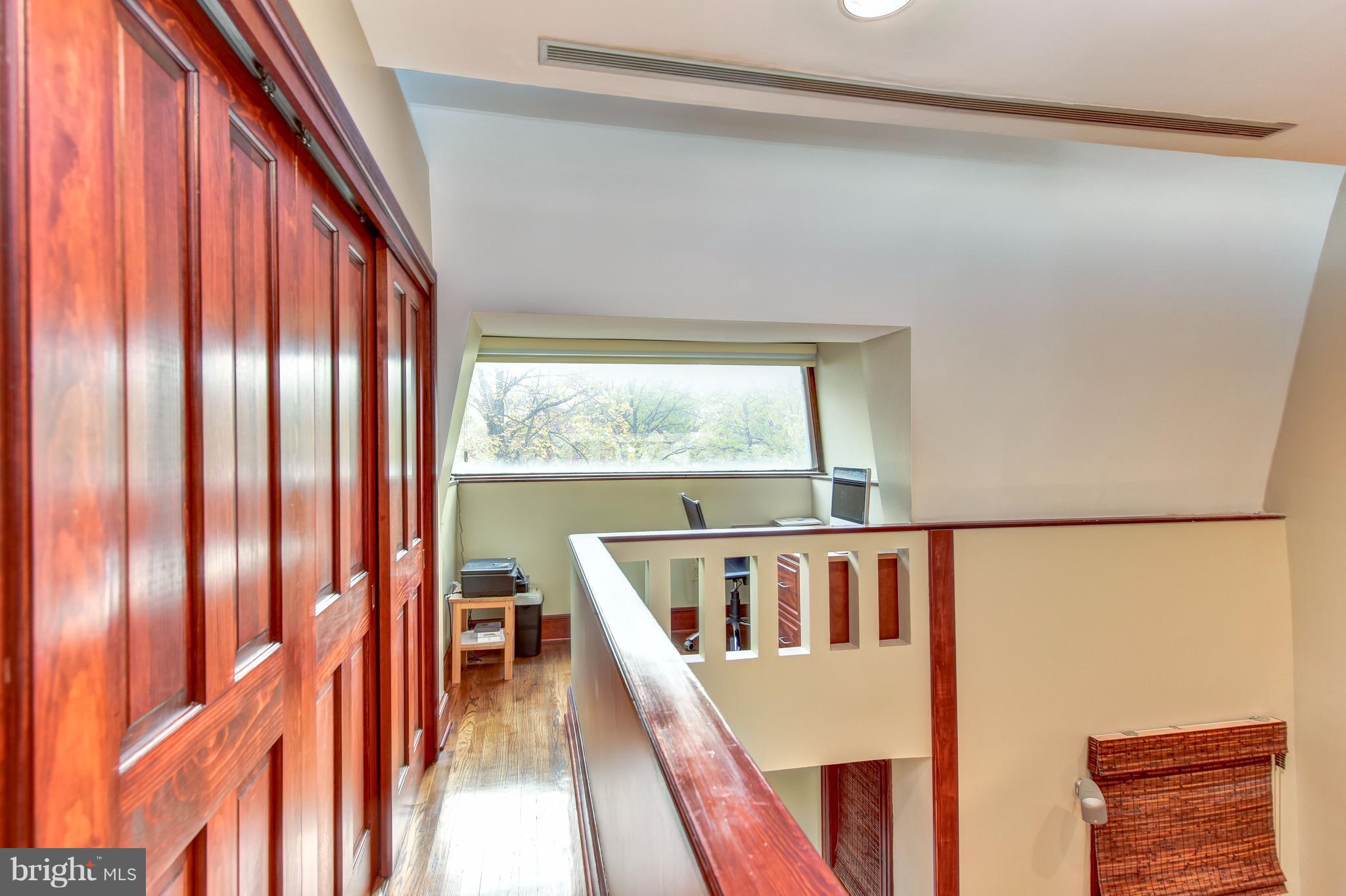 1016 Massachusetts Avenue Northeast Washington, DC 20002 - Photo 21 of 28 a view of balcony with wooden floor