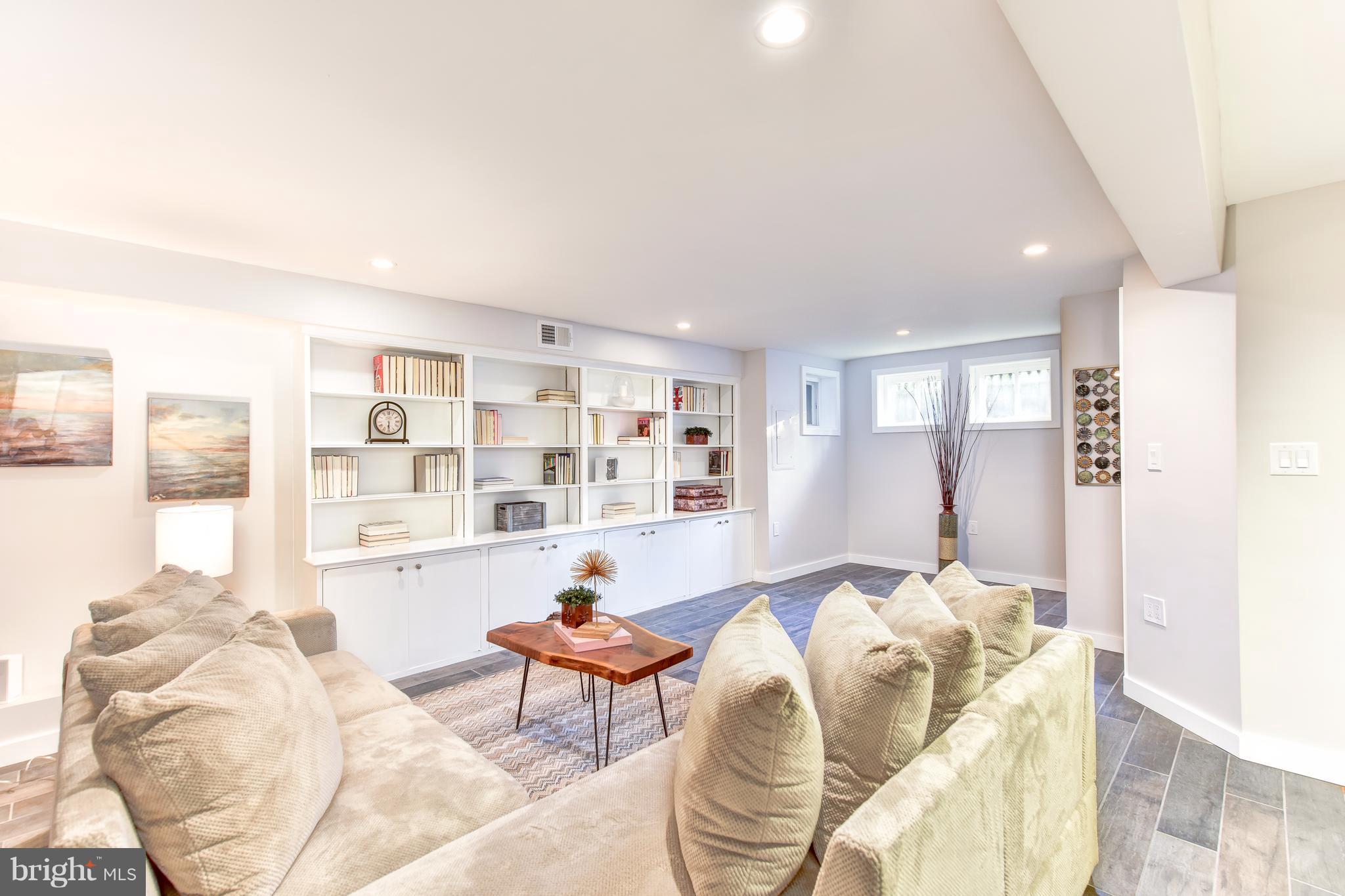 1016 Massachusetts Avenue Northeast Washington, DC 20002 - Photo 23 of 28 a living room with furniture and a large window