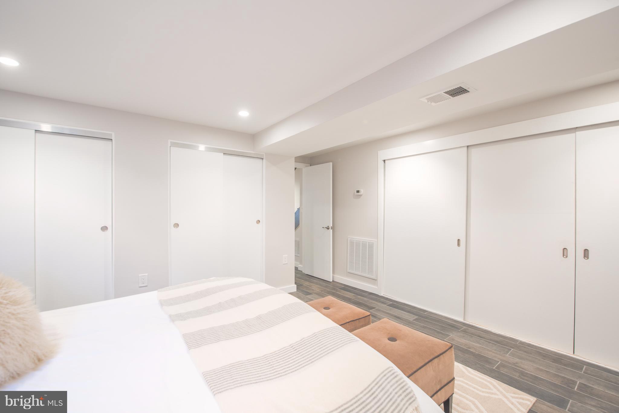 1016 Massachusetts Avenue Northeast Washington, DC 20002 - Photo 25 of 28 a bedroom with a bed and a shower