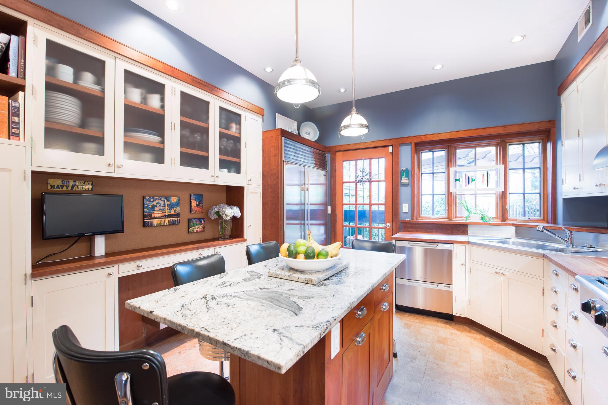 1016 Massachusetts Avenue Northeast Washington, DC 20002 - Photo 8 of 28 a kitchen with a stove and a refrigerator