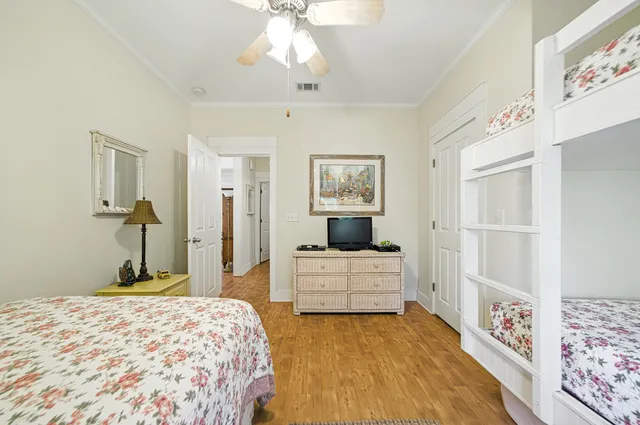 a bathroom with a sink a toilet and a window