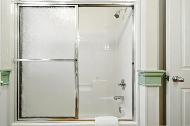 a swimming pool with outdoor seating and yard