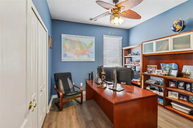 a view of a workspace with furniture and toys