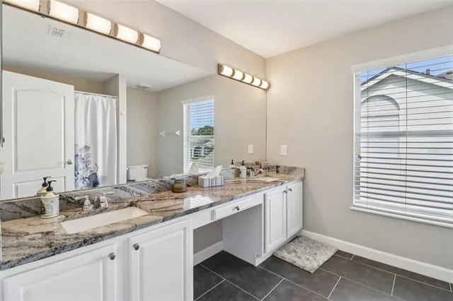 a room with furniture and a flat screen tv