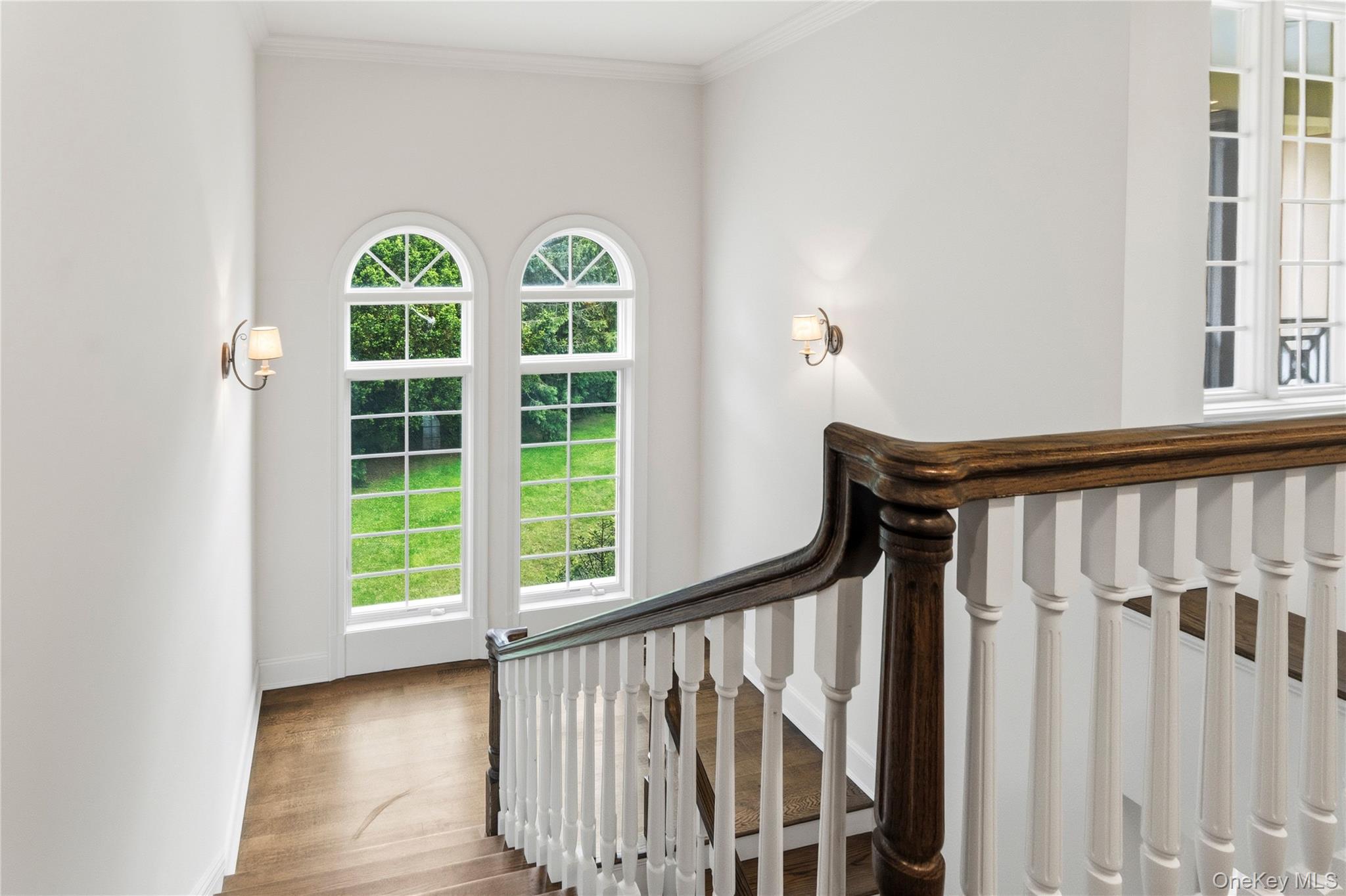 1960 Midlane Road South Syosset, NY 11791 - Photo 36 of 46 a view of front door and porch with wooden floor