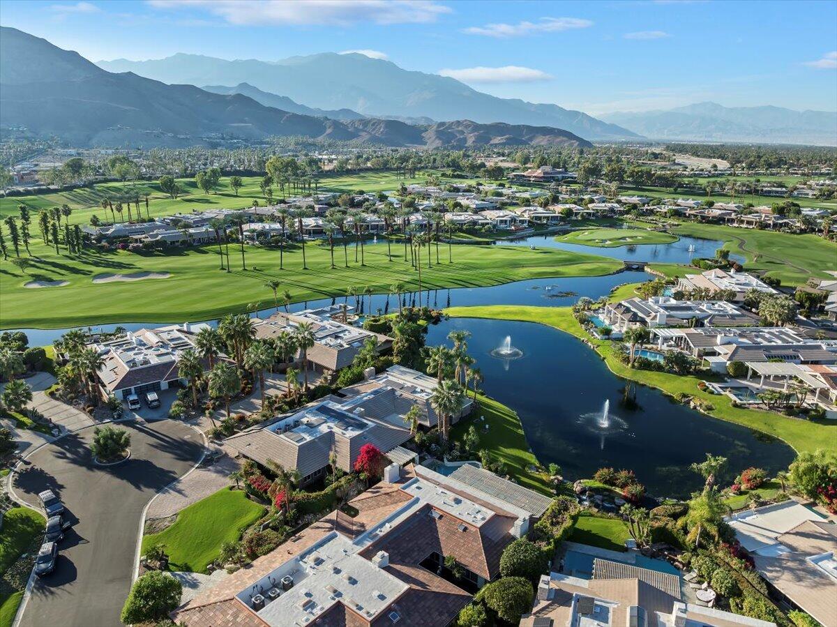 2 Deerfield Court Rancho Mirage, CA 92270 - Photo 103 of 104 an aerial view of a city with lots of residential buildings ocean and mountain view in back