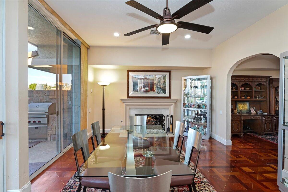 2 Deerfield Court Rancho Mirage, CA 92270 - Photo 43 of 104 a view of a dining room with furniture window and wooden floor