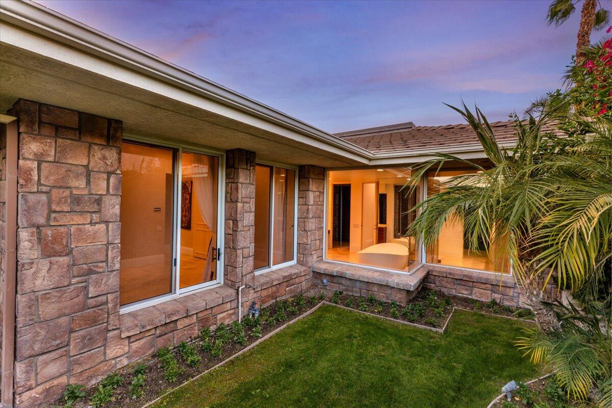2 Deerfield Court Rancho Mirage, CA 92270 - Photo 85 of 104 a front view of a house with a yard