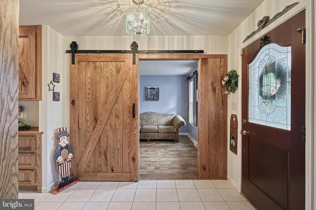 a bedroom with a bed and a shower