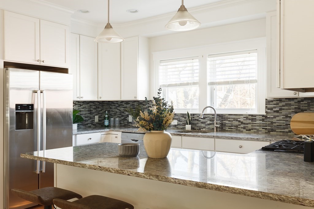 32 Cedar Street, Unit 2 Somerville, MA 02143 - Photo 10 of 20 a kitchen with a refrigerator and a sink