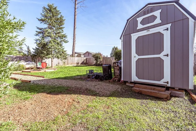 a sign on a pole on a street