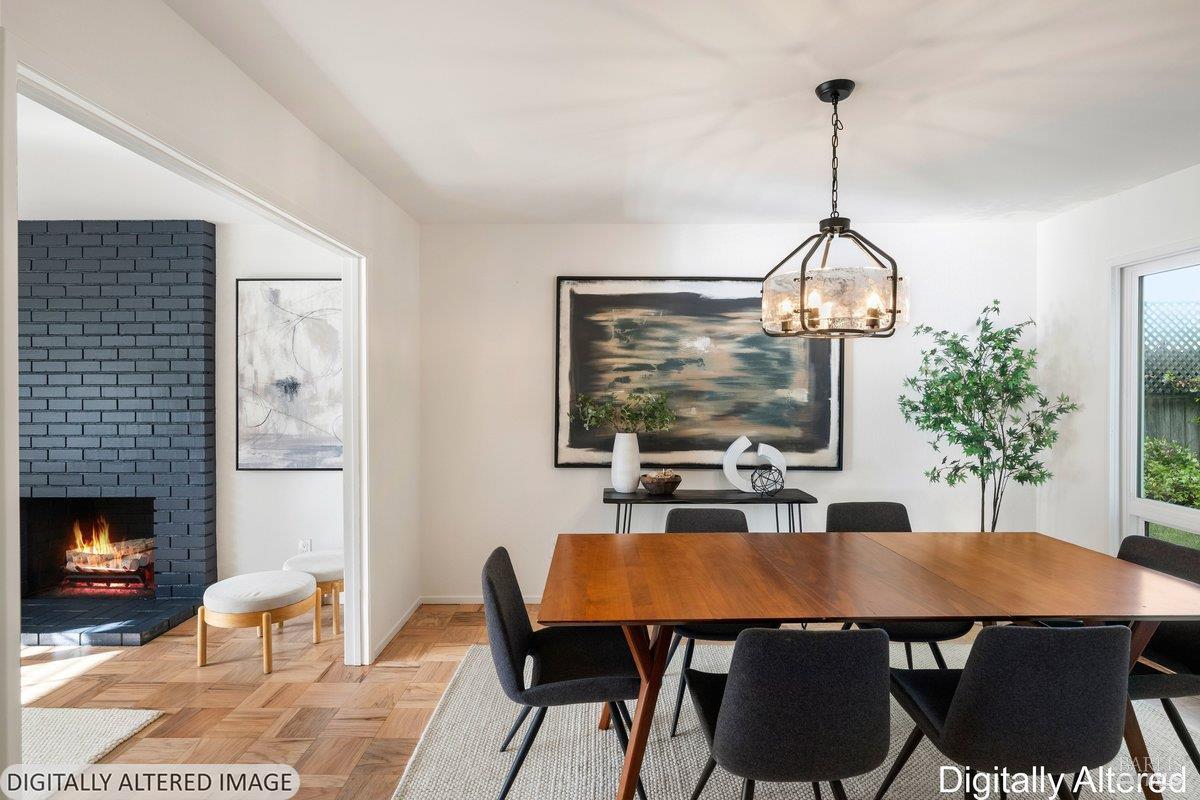 116 Twelveoak Hill Drive San Rafael, CA 94903 - Photo 28 of 93 a view of a dining room and a livingroom with furniture wooden floor a chandelier