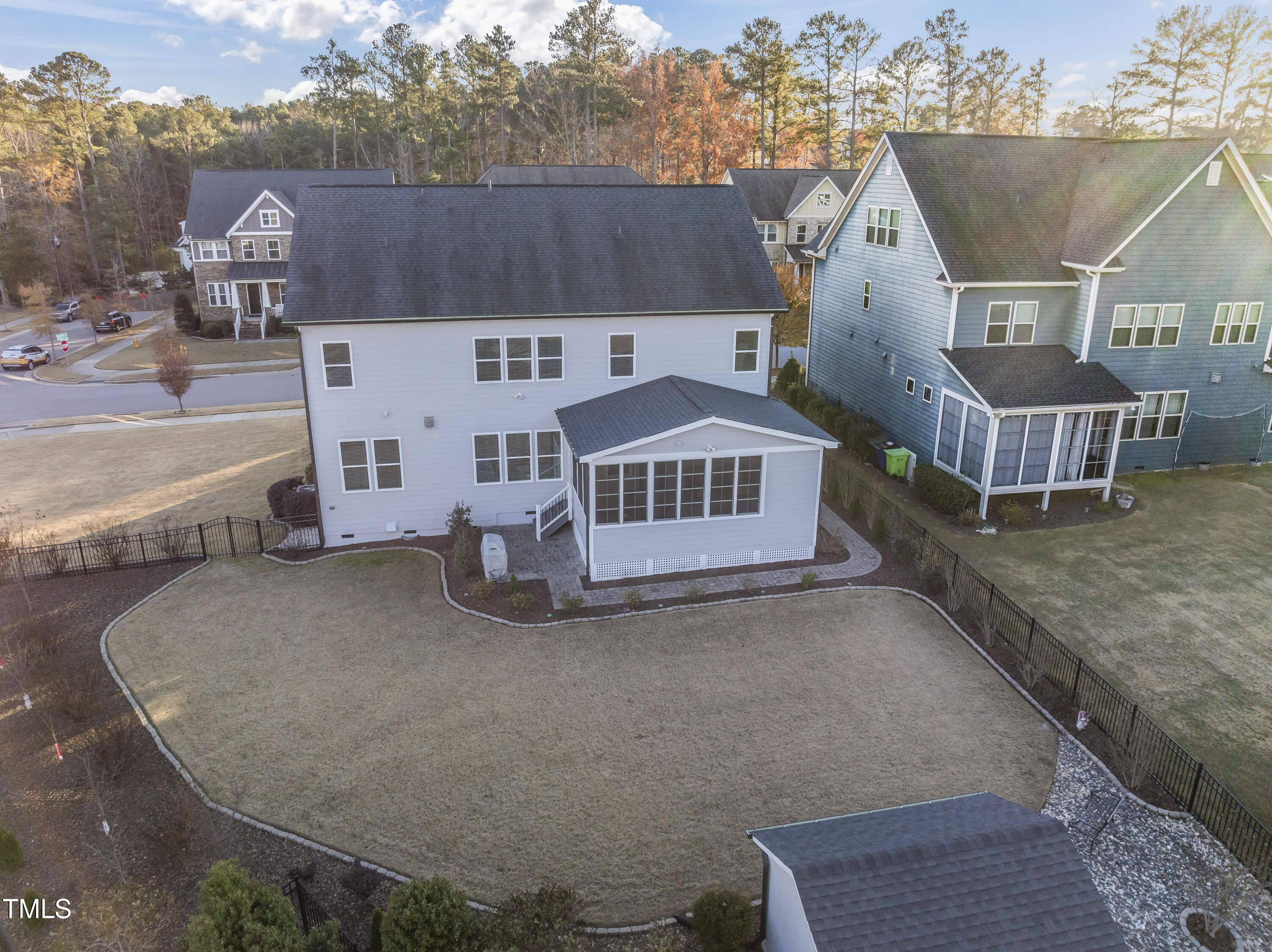 5244 Aleppo Lane Raleigh, NC 27613 - Photo 30 of 41 Extensively landscaped fenced yard with paver patio and shed for extra storage.