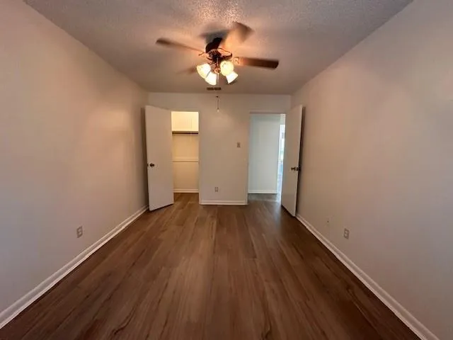 a view of a livingroom with wooden floor