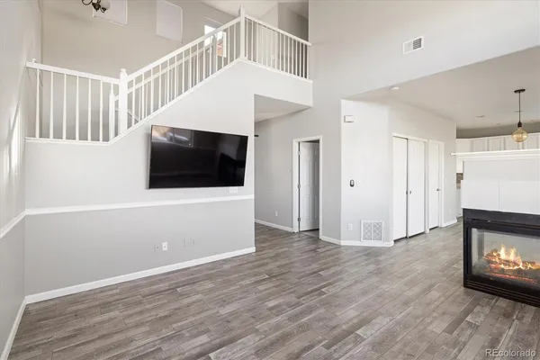 a view of livingroom with furniture and fireplace