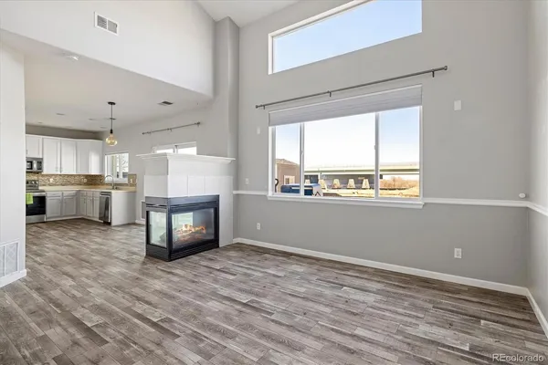 a view of kitchen with furniture and window