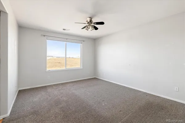 an empty room with a window