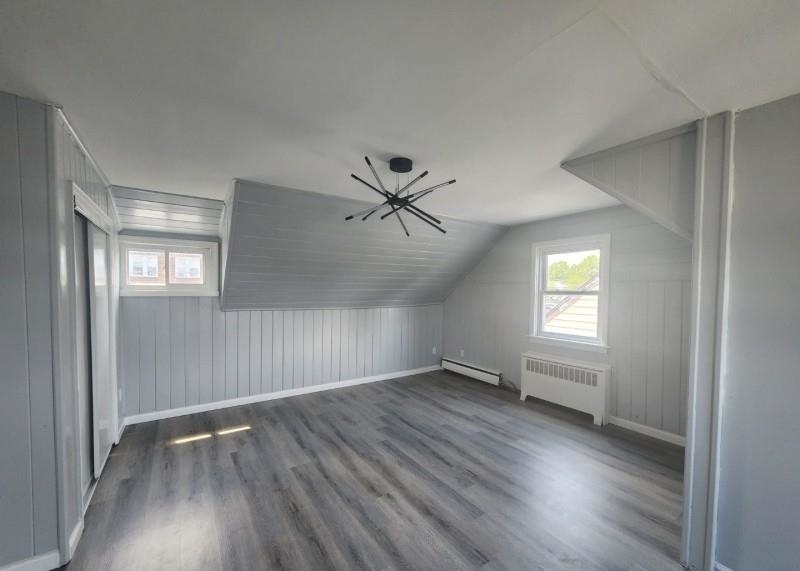123 Prospect Street, Unit 2 Roselle, NJ 07203 - Photo 5 of 9 wooden floor in an empty room with a window