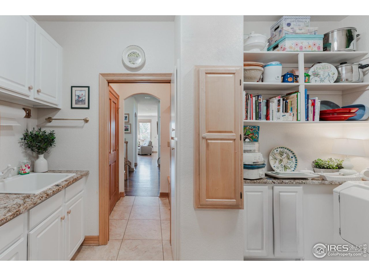 2964 Elk View Drive Evergreen, CO 80439 - Photo 23 of 40 a hallway with a book shelf