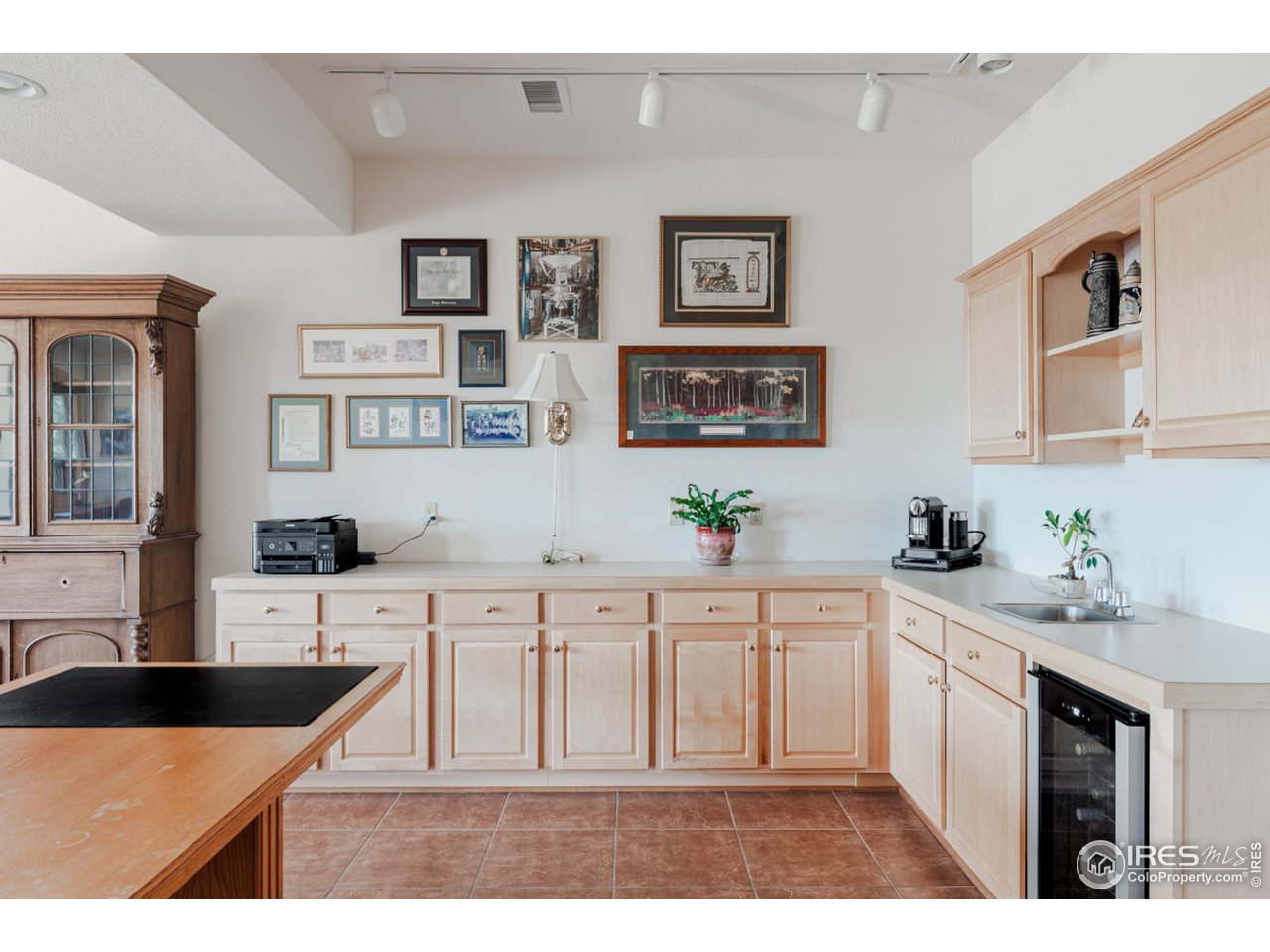 2964 Elk View Drive Evergreen, CO 80439 - Photo 31 of 40 a kitchen with cabinets a sink and appliances