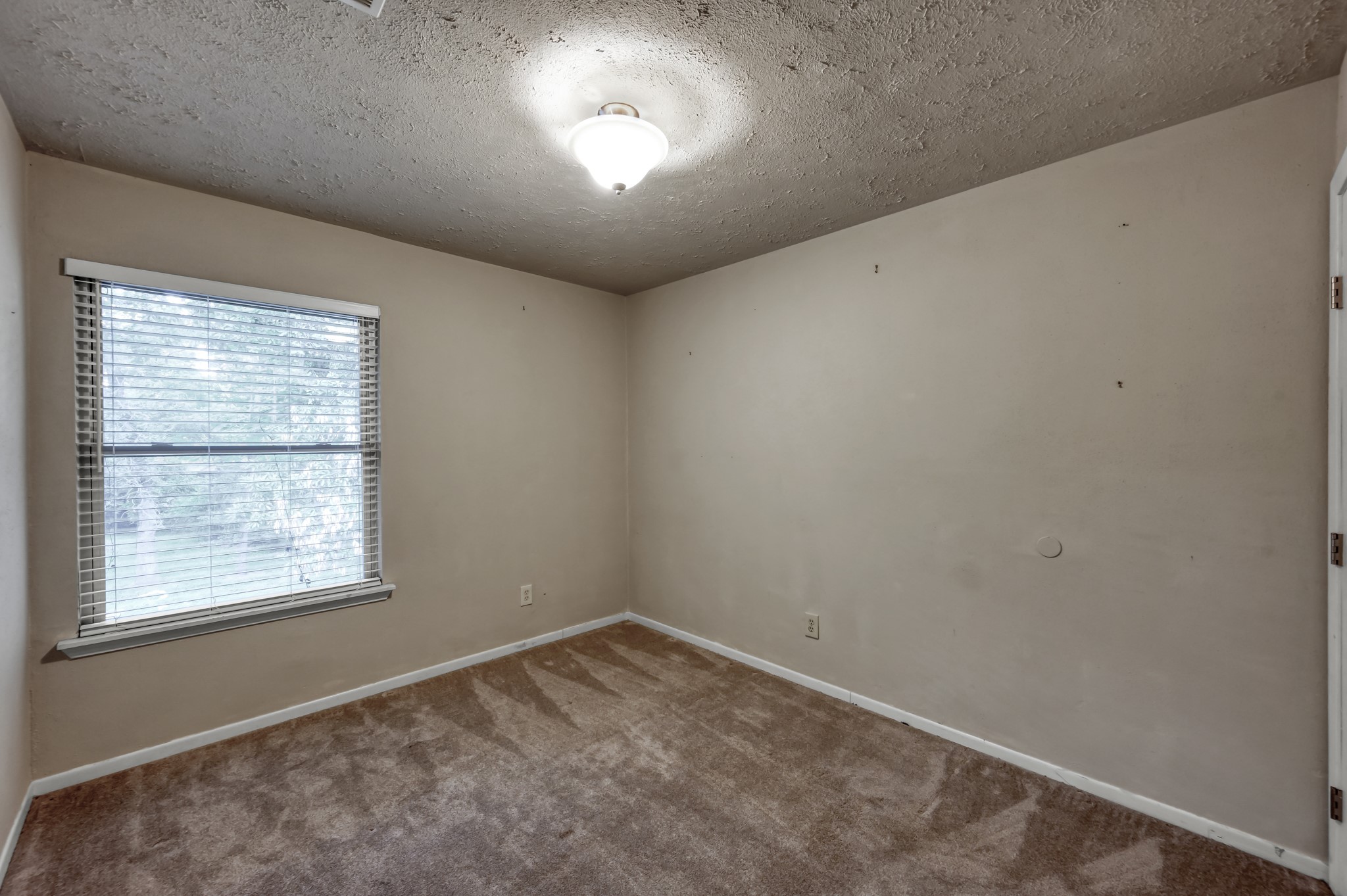 2207 Arendale Lane Spring, TX 77386 - Photo 12 of 30 Additional bedroom located within the upstairs garage apartment.