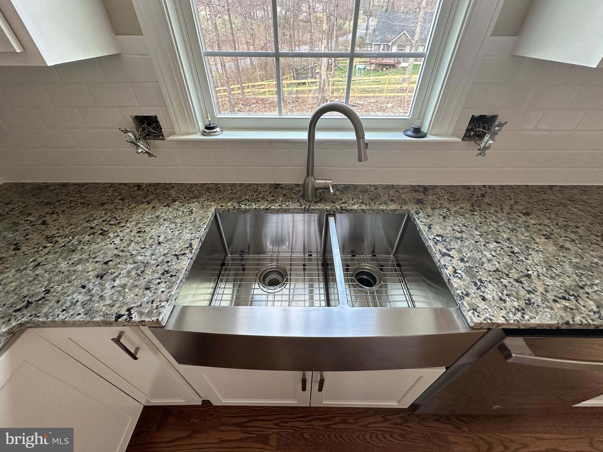 116 Pinto Winchester, VA 22602 - Photo 13 of 23 a view of kitchen sink with granite countertop window and stainless steel appliances