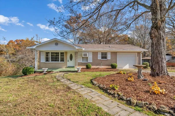 a front view of a house with a patio