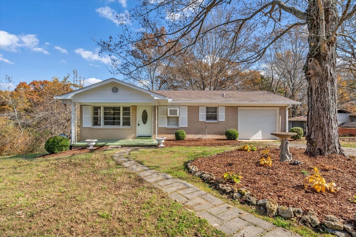 a front view of a house with a patio
