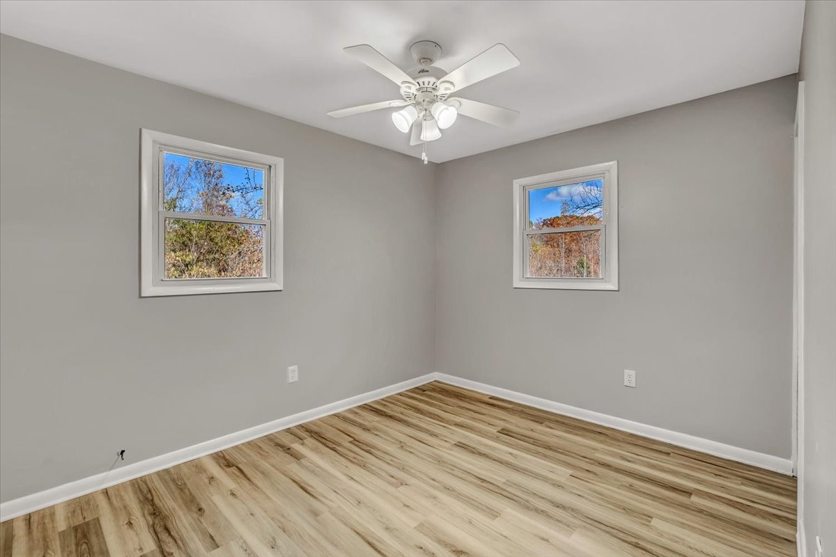 390 Junus Jackson Hollow Road Minor Hill, TN 38473 - Photo 18 of 38 a view of room with window and ceiling fan